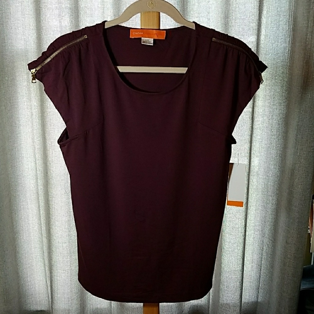 Burgundy top with zipper shoulder detail